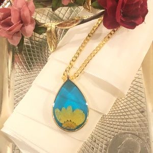 Pressed daisy pendant